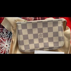 Mini pochette accessories in DA